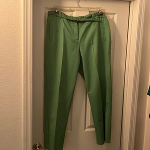 Green straight legged pants with thin belt.